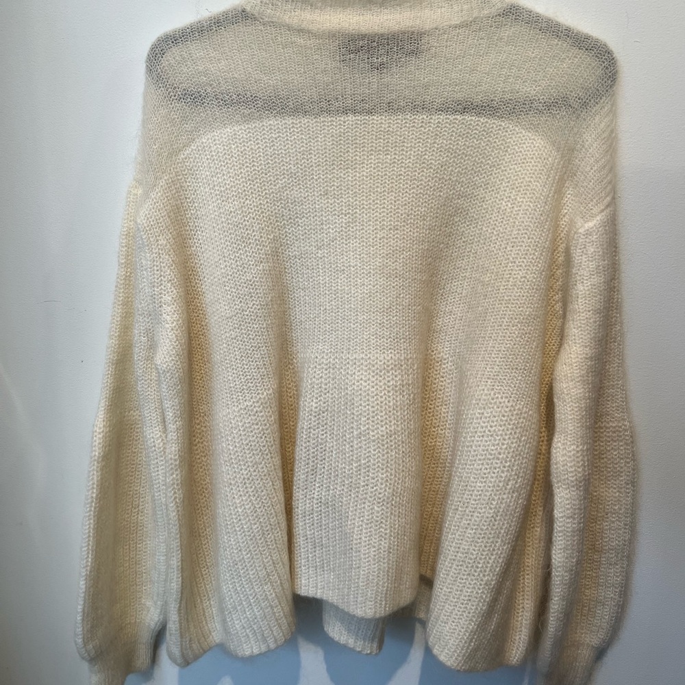 Multi fiber sweater. Excellent condition. Sheer at top with bell sleeves.
